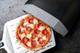 Geperforeerde Pizzaschep