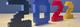 Het jaartal 2022 gebouwd met LEGO stenen in zwart, blauw, rood en geel op een houten ondergrond
