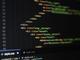 HTML en CSS code in een teksteditor met gekleurde syntax highlighting op een donkere achtergrond
