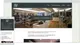 Responsieve website mockup van een kookstudio/winkel met header foto van moderne keukenruimte op desktop en mobiel scherm