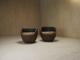 Sculptural mid-century handcarved lounge chairs