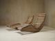 A pair of sculptural French Mid Century lounge chairs