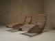 A pair of sculptural French Mid Century lounge chairs