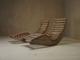 A pair of sculptural French Mid Century lounge chairs