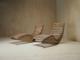 A pair of sculptural French Mid Century lounge chairs