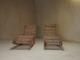 A pair of sculptural French Mid Century lounge chairs