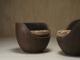 Sculptural mid-century handcarved lounge chairs