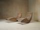 A pair of sculptural French Mid Century lounge chairs