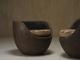 Sculptural mid-century handcarved lounge chairs