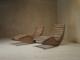 A pair of sculptural French Mid Century lounge chairs
