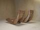A pair of sculptural French Mid Century lounge chairs