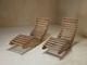 A pair of sculptural French Mid Century lounge chairs