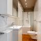 Investeringspand bestaande uit 3 appartementen, handelspand en dubbele garage