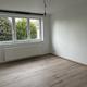 Gelijkvloers appartement met 2 slaapkamers en autostaanplaats