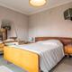 Ruime bel-etage woning met 3 slaapkamers en inpandige garage op perceel van 11a 61ca