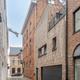 Investeringspand bestaande uit 3 appartementen, handelspand en dubbele garage