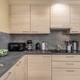 Gelijkvloers appartement met twee slaapkamers, twee terrassen en autostaanplaats