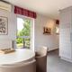 Investeringsappartement met 2 slaapkamers en dubbele garagebox