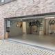 Investeringspand bestaande uit 3 appartementen, handelspand en dubbele garage