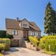 Woning met 3 slaapkamers, inpandige garage en weidse tuin