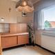 Ruime bel-etage woning met 3 slaapkamers en inpandige garage op perceel van 11a 61ca