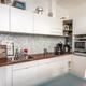 Interessant investeringspand met handelsruimte en twee appartementen