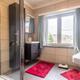 Ruime bel-etage woning met 3 slaapkamers en inpandige garage op perceel van 11a 61ca