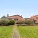 Ruime bel-etage woning met 3 slaapkamers en inpandige garage op perceel van 11a 61ca