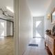 Grote, energiezuinige woning met drie slaapkamers, garage en atelier op een zonnig perceel