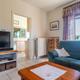 Woning met 3 slaapkamers, inpandige garage en weidse tuin