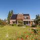 Woning met 3 slaapkamers, inpandige garage en weidse tuin