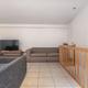 Investeringspand bestaande uit 3 appartementen, handelspand en dubbele garage