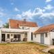 Karaktervolle woning met 4 slaapkamers, dubbele garage en ruime tuin