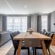 Grote, energiezuinige woning met drie slaapkamers, garage en atelier op een zonnig perceel