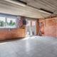 Grote, energiezuinige woning met drie slaapkamers, garage en atelier op een zonnig perceel