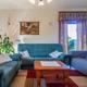 Woning met 3 slaapkamers, inpandige garage en weidse tuin