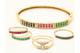 Geelgouden stijve armband bezet met saffieren, robijnen, smaragden en diamanten
