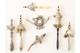 Lot with 7 various silver rattles
